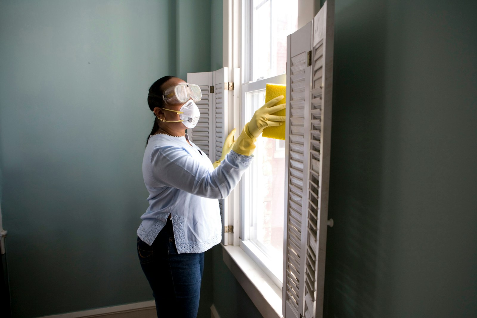 Professional commercial cleaner in a modern office lobby